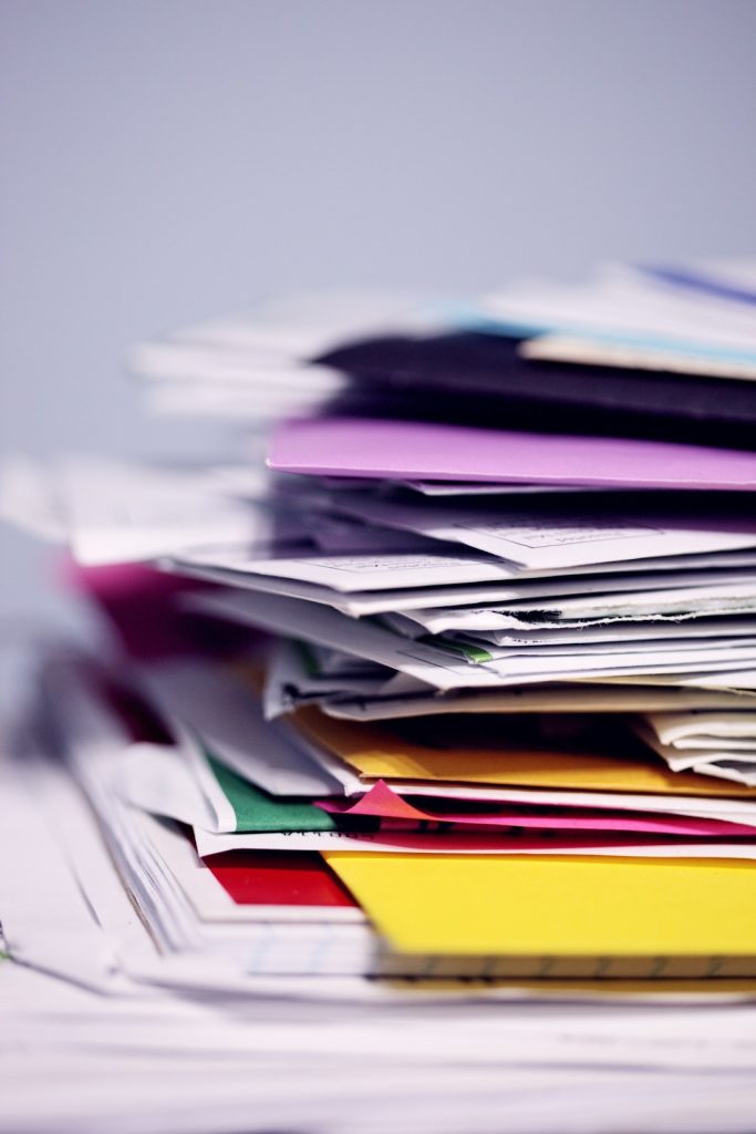 Mastering the First Impression: Your intriguing post title goes here Pile of mail waiting to be sorted and shredded.